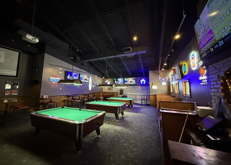 The bar lounge and pool tables at Twain's Tavern