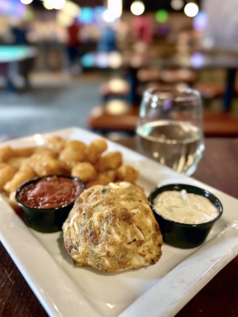 Broiled jumbo lump crab cake with tots at Twain's Tavern in Pasadena, MD