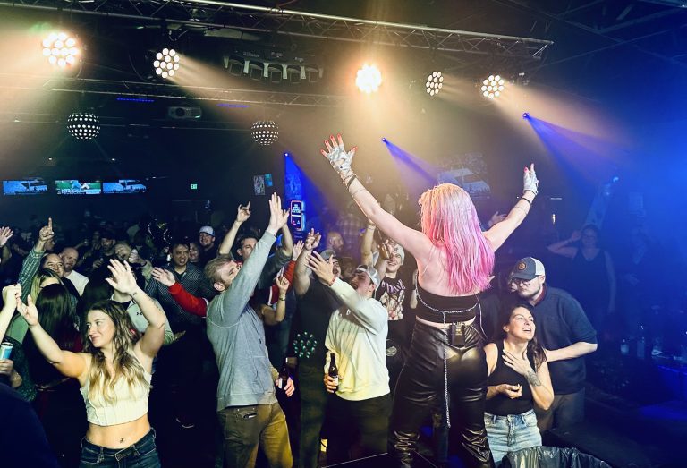 Hands up on the dance floor at Twain's Tavern