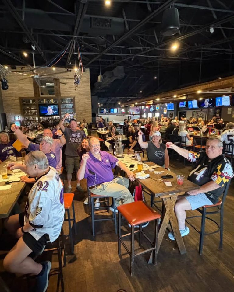 Ravens fans raising a toast on game day at Twain's Tavern