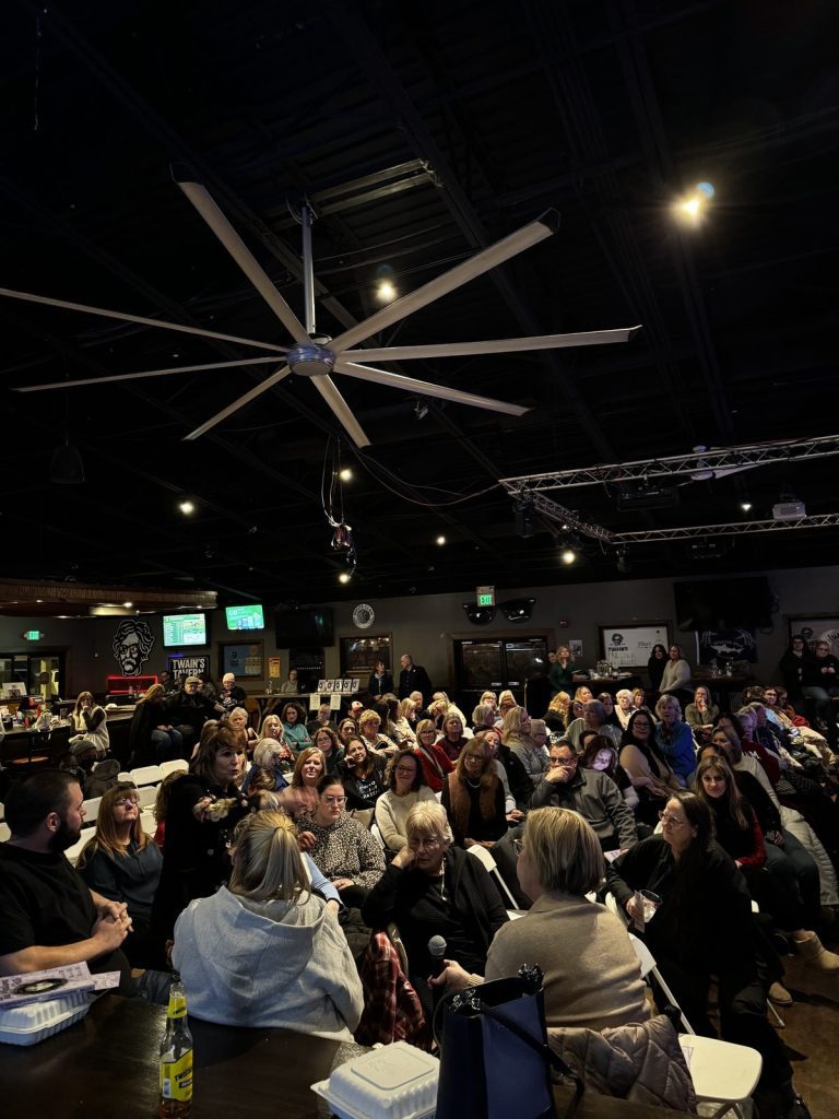 A seated crowd for a show at Twain's Tavern